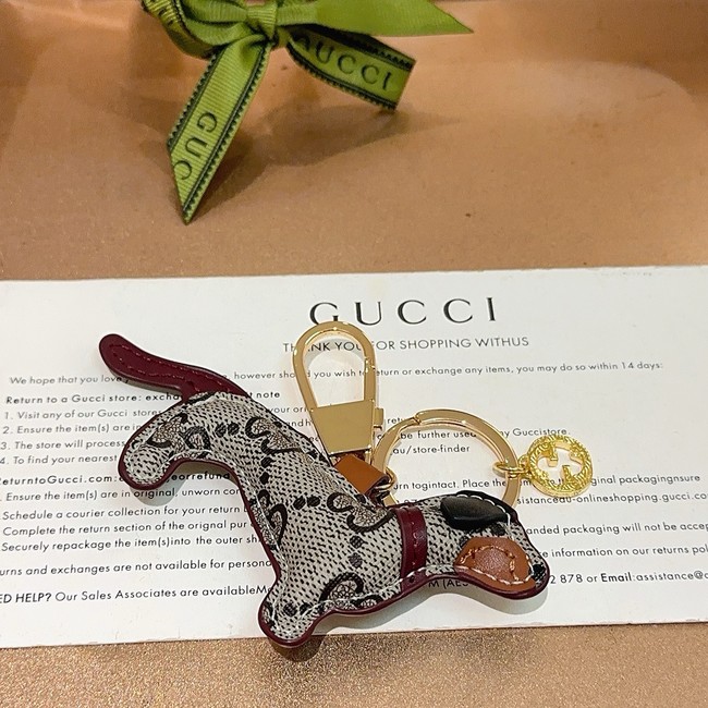 Gucci Dog-shaped bag charm 821812